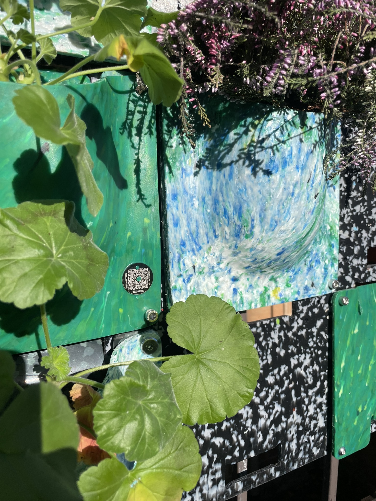 A single marbled recycled-plastic planter tile